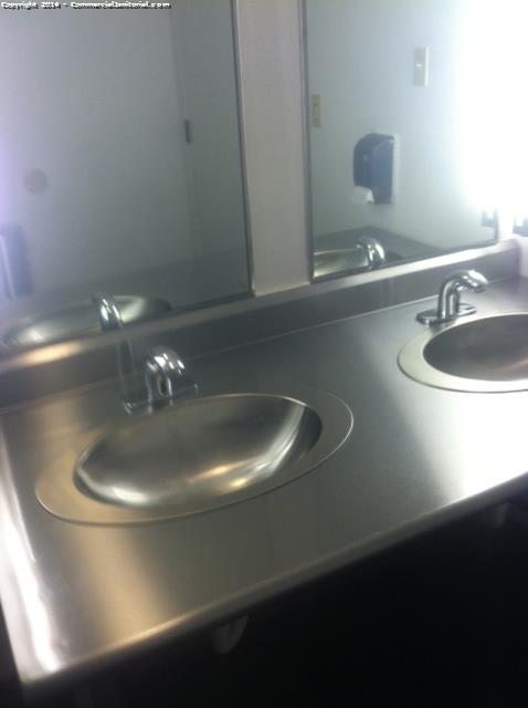 clean stainless steel sinks as part of nightly janitorial services