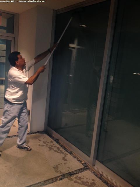Cleaning the glass wall inside and out
