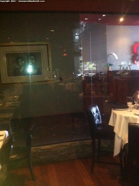 Bar and restaurant interior glass wall cleaning service