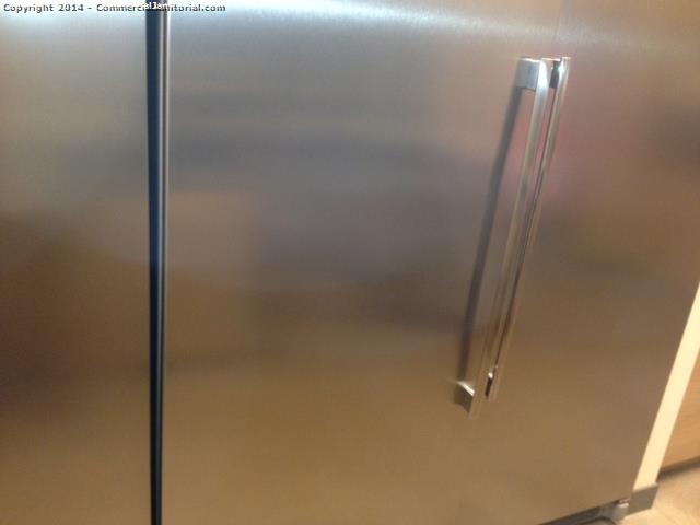stainless steel fridge cleaning as part of nightly janitorial 