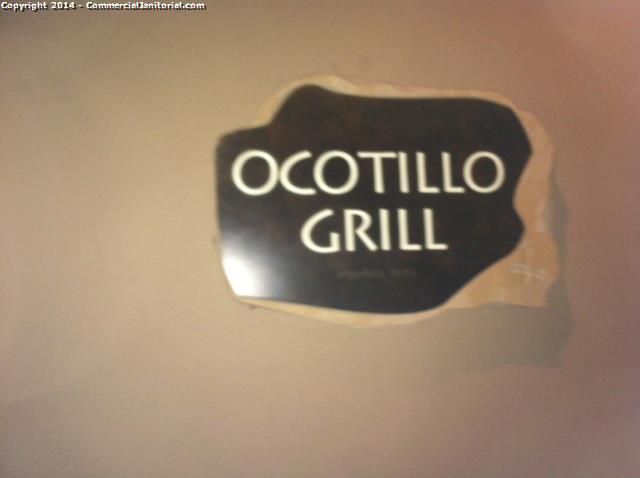 Ocotillo grill sign has been cleaned and disinfected all finger marks were removed .