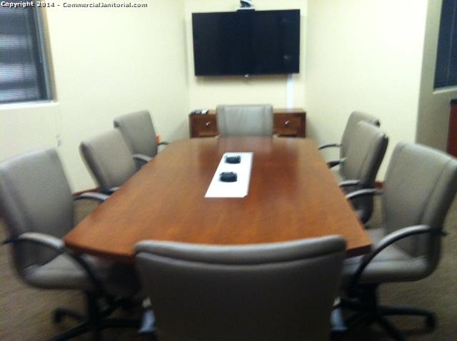 Clean and organize a conference room in a bank