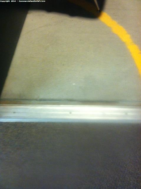7/1-14- Door threshold was detail cleaned and all scuff marks/black marks removed.