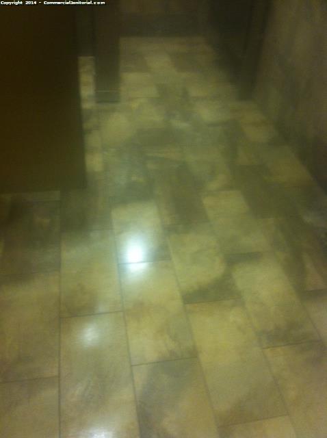 After the floor were scrubbed and waxed in each stall in women