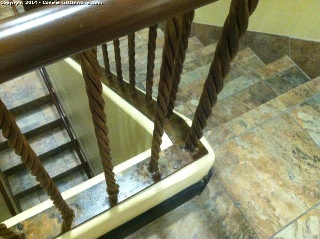 cleaning a stairway in an office