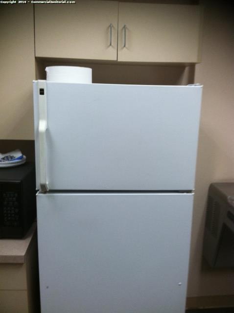 Break room refrigerator was cleaned inside and out , handle was cleaned, cabinets were cleaned 