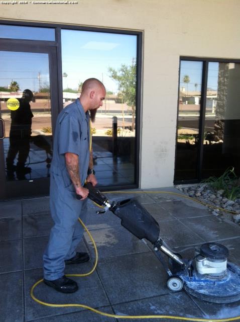 used side by side to scrub concrete and power washed outside area front and back entrances. 